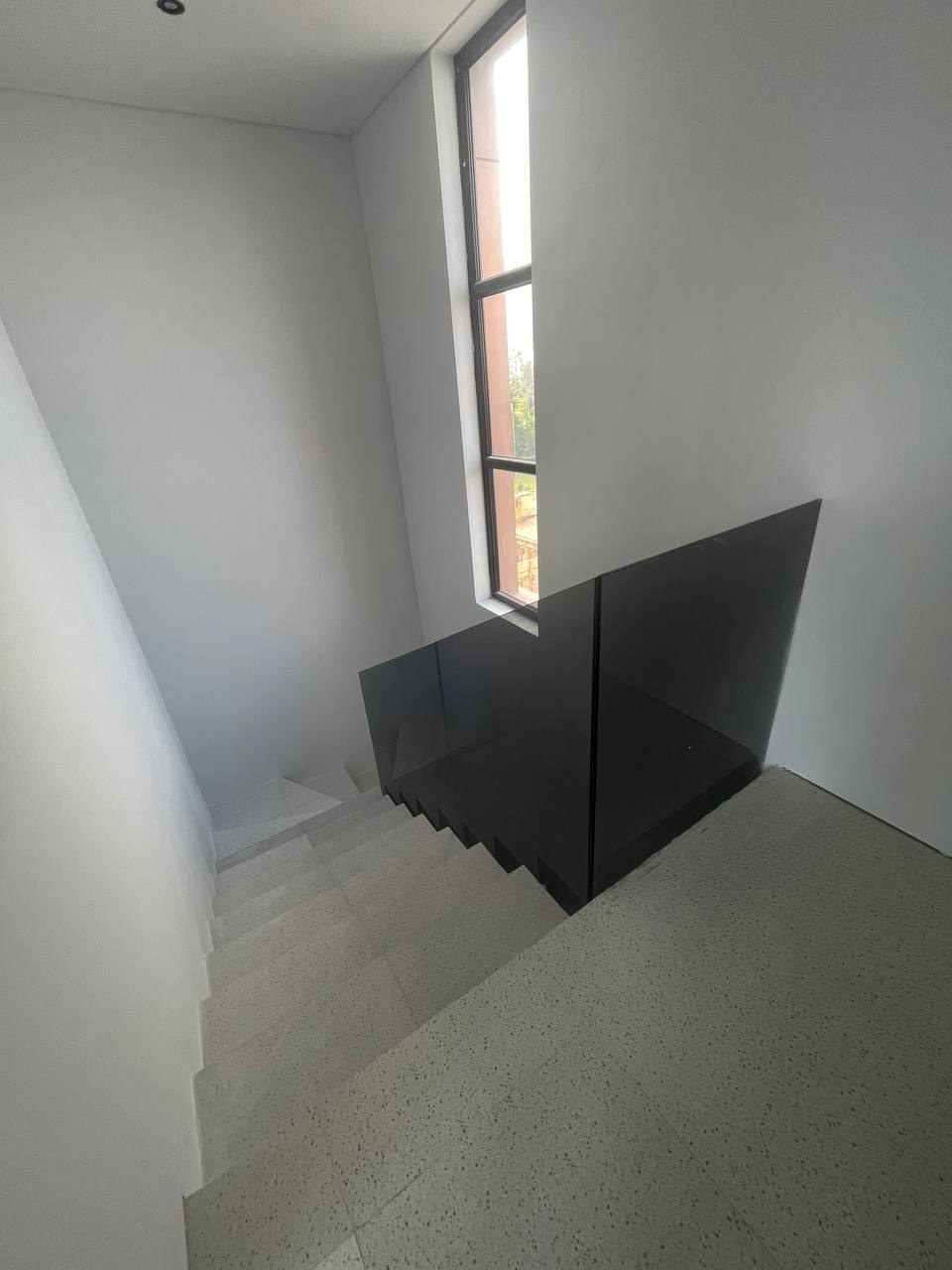 Aquamarine townhouse after renovation photo