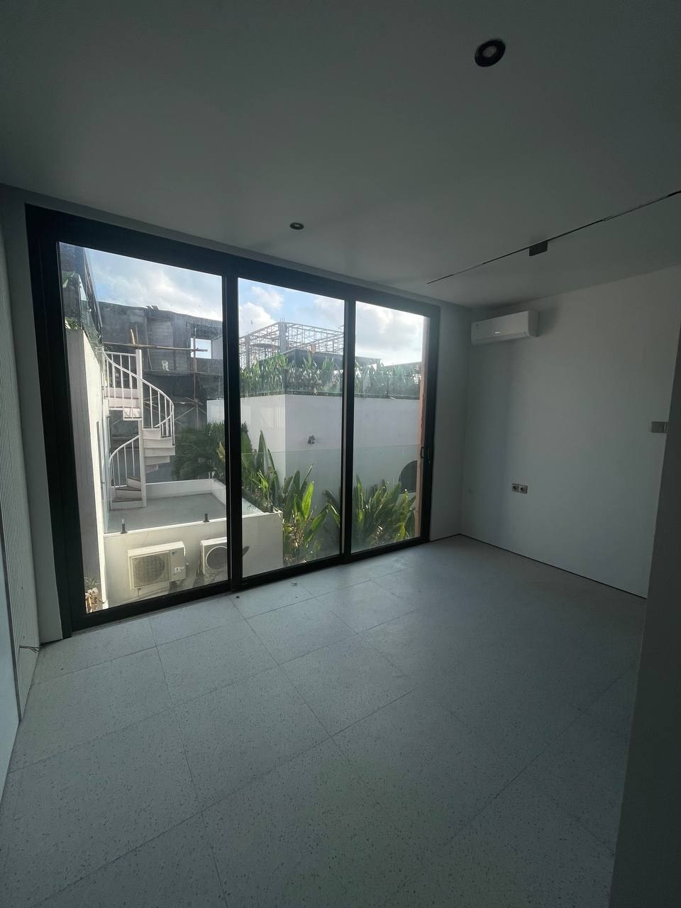 Aquamarine townhouse before renovation photo